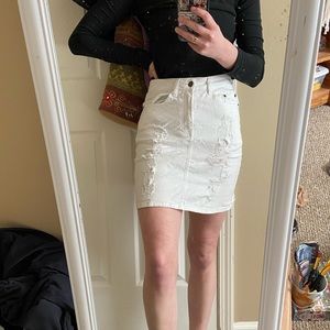 white jean skirt, ripped